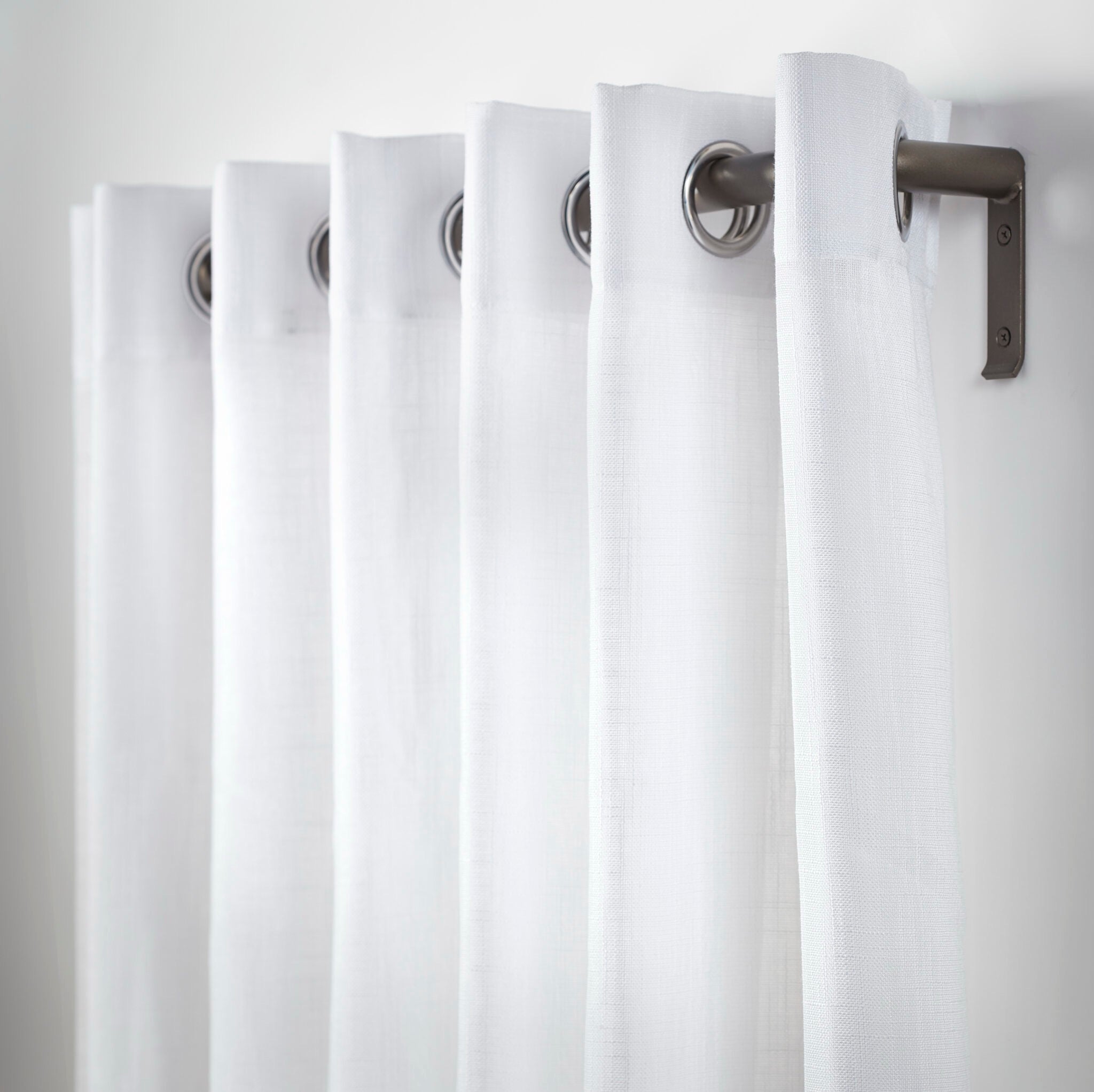 Magnolia French Return Drapery Pole Set in forged iron with baton draw for modern and traditional curtain installations